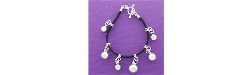Pulseras piel y plata